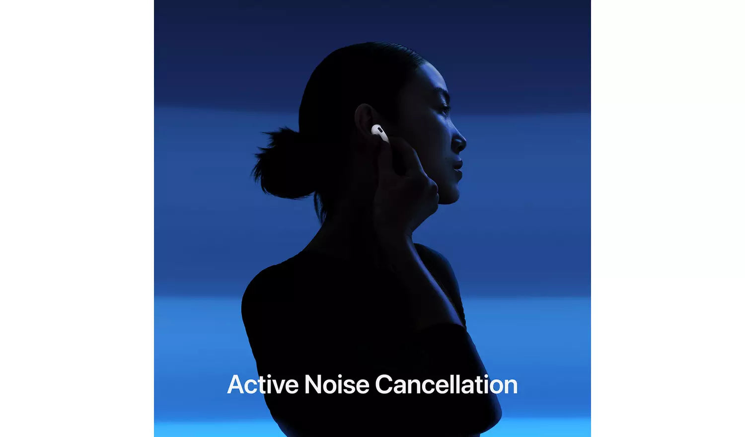White earbuds in use for active noise cancellation, on-ear silhouette