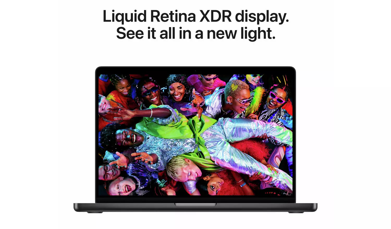 MacBook Pro open display with colorful Liquid Retina XDR image and text
